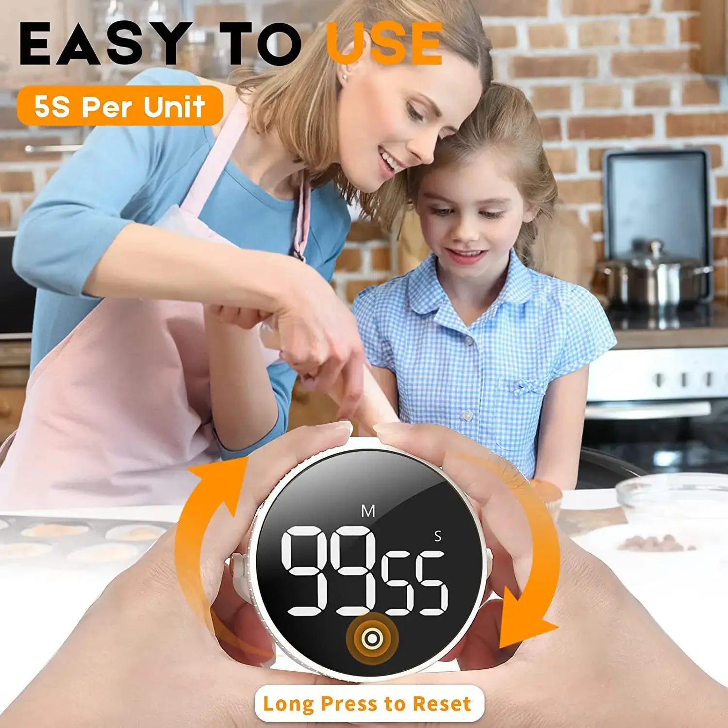 The magnetic digital kitchen timer showing its long press reset button. A women and a girl working in the kitchen.